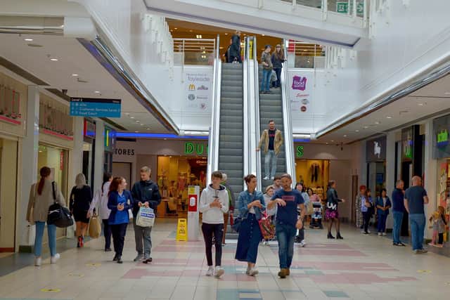Shoppers in Foyleside shopping centre in early 2020 before masks were introduced. DER2027GS - 019
