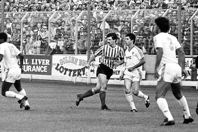 Felix Healy and Liam Coyle in action against the star-studded Benfica team which arrived in Derry for a European Cup clash in 1989.
