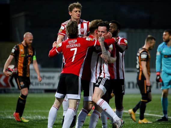 FIGHTING SPIRIT: Derry City players celebrate Cameron McJannet's second half equaliser against Dundalk. (PIcture by Kevin Moore).