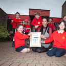 Miss Bronagh Lynch, teacher pictured with pupil representatives after picking up the ‘Sustrans School Mark’ bronze award this week. Included are Naiya McCafferty, Aoife Lynch, Niah Barnfield, Riley McColgan, Andrew O'Doherty, Maya O'Doherty and Lola Foy.