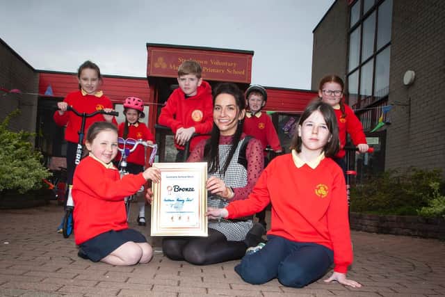 Miss Bronagh Lynch, teacher pictured with pupil representatives after picking up the ‘Sustrans School Mark’ bronze award this week. Included are Naiya McCafferty, Aoife Lynch, Niah Barnfield, Riley McColgan, Andrew O'Doherty, Maya O'Doherty and Lola Foy.