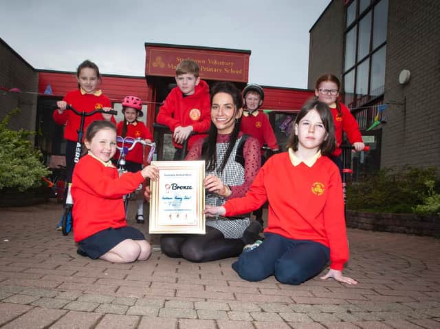 Miss Bronagh Lynch, teacher pictured with pupil representatives after picking up the ‘Sustrans School Mark’ bronze award this week. Included are Naiya McCafferty, Aoife Lynch, Niah Barnfield, Riley McColgan, Andrew O'Doherty, Maya O'Doherty and Lola Foy.