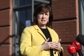 Northern Ireland Economy Minister Diane Dodds speaks to the media outside the Natural Hair Company, Lisburn, Northern Ireland, where hairdressers are able to resume trading with lockdown restrictions beginning to gradually ease. Picture date: Friday April 23, 2021.