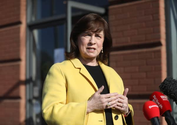 Northern Ireland Economy Minister Diane Dodds speaks to the media outside the Natural Hair Company, Lisburn, Northern Ireland, where hairdressers are able to resume trading with lockdown restrictions beginning to gradually ease. Picture date: Friday April 23, 2021.