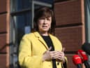Northern Ireland Economy Minister Diane Dodds speaks to the media outside the Natural Hair Company, Lisburn, Northern Ireland, where hairdressers are able to resume trading with lockdown restrictions beginning to gradually ease. Picture date: Friday April 23, 2021.