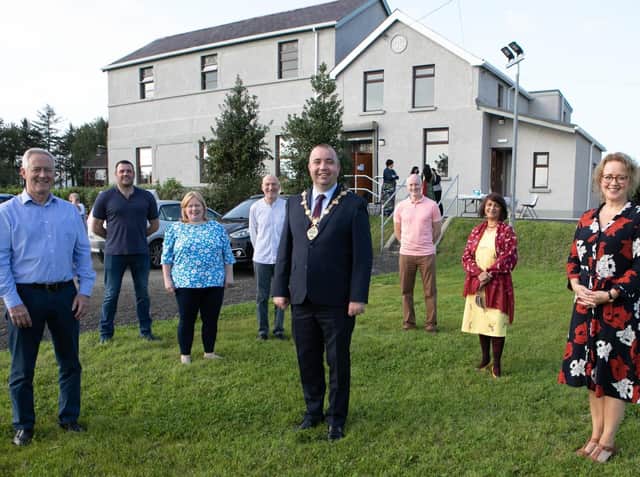 The Mayor of Derry and Strabane, Colr. Brian Tierney, pictured with staff, board members and volunteers outside the Victoria Hall in Culmore during a recent visit.