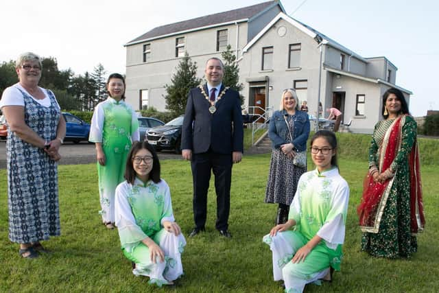 The Mayor, Colr. Brian Tierney, on a visit to Culmore with participants in a Good Relations Week event.