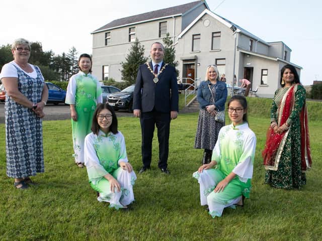 The Mayor, Colr. Brian Tierney, on a visit to Culmore with participants in a Good Relations Week event.