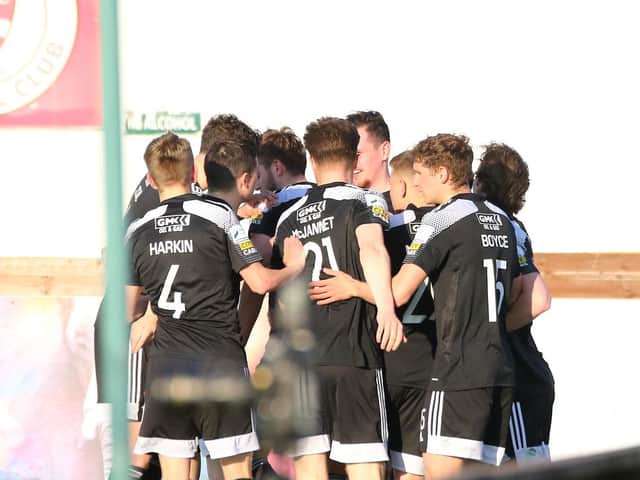 Derry City players celebrate after Will Patching's penalty at the start of the second half. Picture by Kevin Moore.