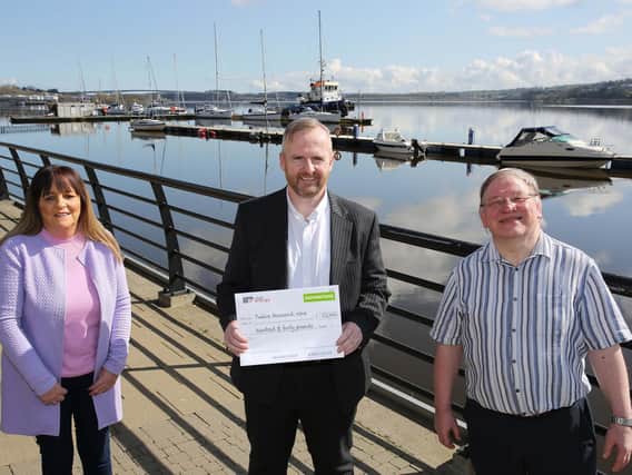 Damian Wilson, Managing Director of Click Energy, presenting Brendan and Mary from Samaritans with a cheque for £12,940. The money was raised over the past six months from donations made by Click Energy customers. Samaritans provide emotional support for people in need, and its free-to-call phoneline 116123 is open 24 hours a day, 365 days a year.