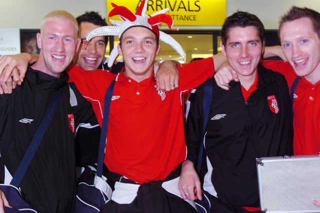 Ruaidhri Higgins and Barry Molloy (right) celebrating their famous UEFA Cup victory over Gretna alongside Kevin Deery, Stephen O'Flynn and David Forde in 2006.
