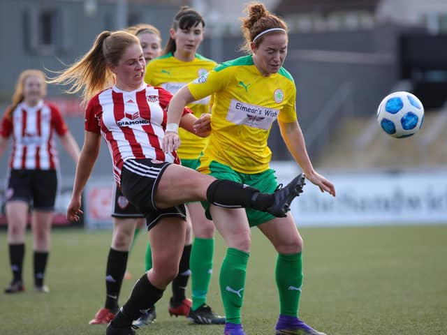 Derry City Women's Alison McGonagle tussles with Cliftonville Ladies Marissa Callaghan during Wednesday night's game at the Brandywell. Picture by John Paul McGinley/JPJPhotography
