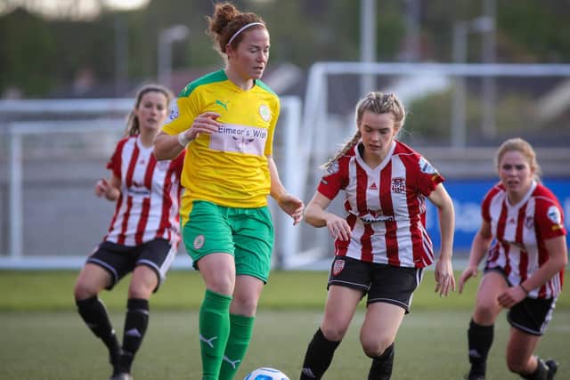 Cliftonville Ladies and Northern Ireland international Marissa Callaghan shields the ball from Derry City Women's Lauren Cregan, during Wednesday night's clash at the Brandywell. Picture by John Paul McGinley/JPJPhotography