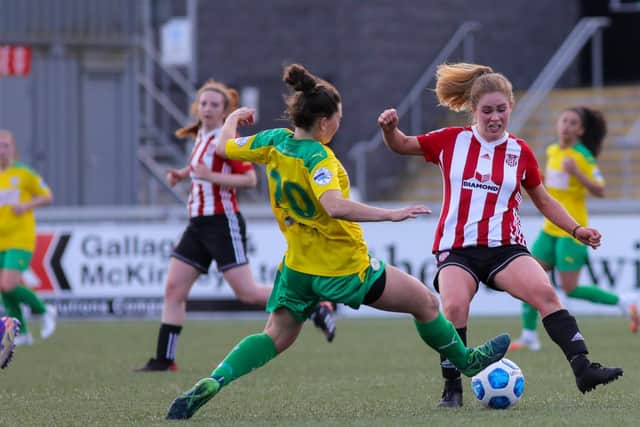 Derry City Women's Alison McGonagle puts in a crunching tackle on Cliftonville Ladies' Megan Weatherall. Picture by John Paul McGinley/JPJPhotography