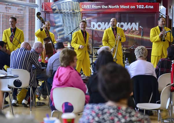 The Jive Aces performing in the Foyleside Shopping Centre during the 2015 City of Derry Jazz Festival. Photo: George Sweeney / Derry Journal.