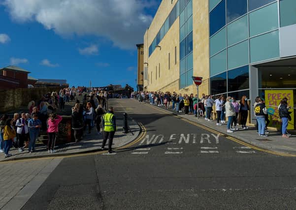Hundreds of shoppers queue outside Primark on Friday morning as non-essential retails outlets reopen. Photo: George Sweeney / Derry Journal.  DER2117GS – 014