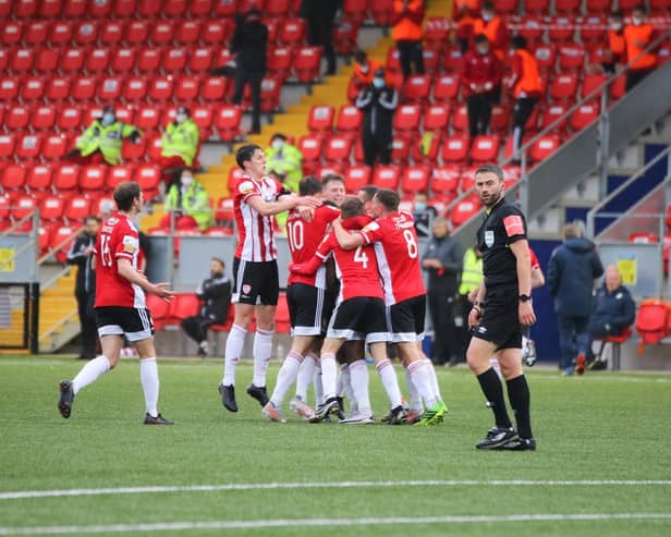 Derry City celebrate James Akintunde's opening strike in the derby. Photograph by Kevin Moore.