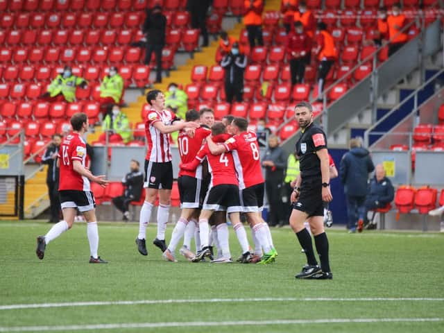 Derry City celebrate James Akintunde's opening strike in the derby. Photograph by Kevin Moore.