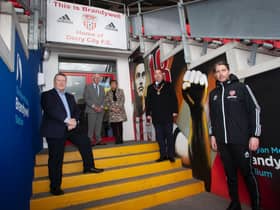 The Mayor of Derry City and Strabane District Council, Brian Tierney pictured with the late Mark Farren's parents Michael and Kathleen visiting their son's mural at the Ryan McBride Brandywell Stadium. Included on left is Philip O'Doherty, chair, Derry City and right, Ruaidhri Higgins, Derry City manager.