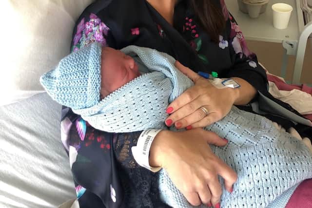 Western Trust Midwife Corina McGarrigle and her newborn son who was born on International Midwives Day.