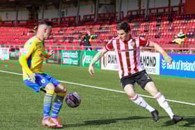 Derry City defender Ciaran Coll attempts to get past Longford's Dylan Grimes at the Ryan McBride Brandywell Stadium. Picture by Kevin Moore.