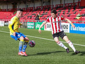 Derry City defender Ciaran Coll attempts to get past Longford's Dylan Grimes at the Ryan McBride Brandywell Stadium. Picture by Kevin Moore.