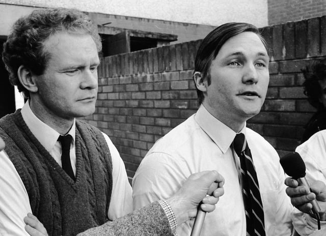 August... Martin Galvin, of Noraid, talks to the media in Derry's Bogside alongside Martin McGuinness.