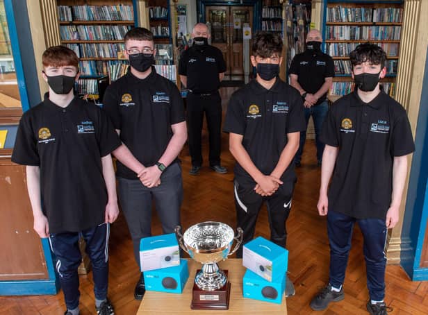 Lumen Christi College students Aodhan Gillespie, Kiernan Nash,  Marco Logue and Luca Dunlop, who were the winners of the NWRC Engineering Challenge pictured with John Cartin, NWRC Deputy Head of Training and Skills and Philip Devlin, Manager NWRCâ€TMs PDC. (pic Martin McKeown).