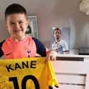Five-year-old Spurs fan Caleb Toland with a signed shirt he received from Spurs and England player Harry Kane earlier this week.
