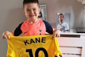 Five-year-old Spurs fan Caleb Toland with a signed shirt he received from Spurs and England player Harry Kane earlier this week.