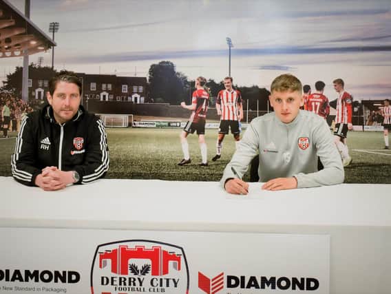 Derry City manager Ruaidhri Higgins and defender Ronan Boyce who has signed a contract extension keeping him at the club for at least another three and a half years.