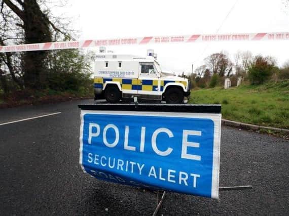 A police Land Rover on the Ballyquin Road after a device was discovered on April 19.