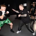 Brett McGinty receives his final instructions from trainer, Ricky Hatton ahead of his professional debut last December. Photograph by Christopher Dean for Hennessy Sports.