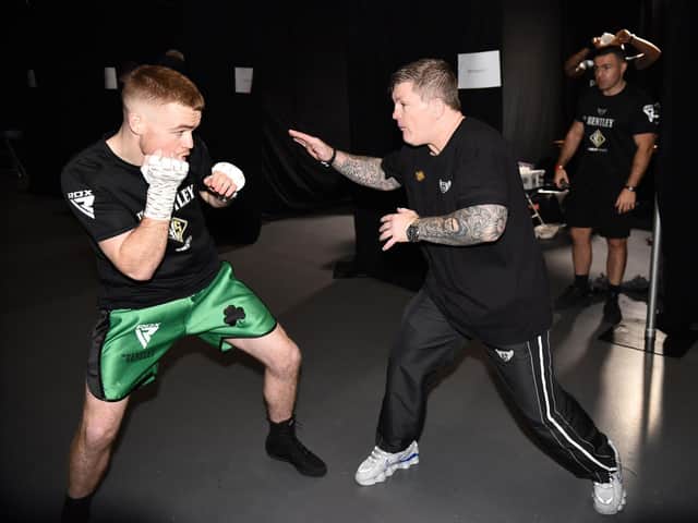 Brett McGinty receives his final instructions from trainer, Ricky Hatton ahead of his professional debut last December. Photograph by Christopher Dean for Hennessy Sports.