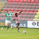 James Akintunde is brought down for a penalty at the start of the second half in Tallaght by Sean Hoare. Picture by Kevin Moore.