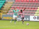 James Akintunde is brought down for a penalty at the start of the second half in Tallaght by Sean Hoare. Picture by Kevin Moore.