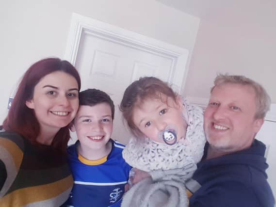 Sarah McGill with her children Aidan and Niamh and husband Gavin.
