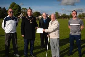 .The Mayor of Derry City and Strabane District Council, Brian Tierney pictured at Clooney Park West on Monday evening announcing the sponsorship of pitches for the Derry and District FA League this season to mark the organisation’s centenary. Included from left are Willie Barrett, secretary, Liam Smyth, games organiser, Jimbo Crossan, chairman and Darren Smyth, match secretary. (Photo: Jim McCafferty Photography)