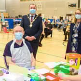 Mayor Brian Tierney pictured previously at the Covid -19 vaccination centre in the Foyle Arena with Western Health and Social Care Trust staff who are delivering the vaccine programme. Included were Dr. Alan McKinney who is one of the retired doctors to help during the pandemic, Anne McConnell, HR Director WHSCT and School nurse Geraldine Mulholland.  Picture Martin McKeown.