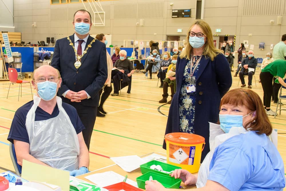 Mayor Brian Tierney pictured previously at the Covid -19 vaccination centre in the Foyle Arena with Western Health and Social Care Trust staff who are delivering the vaccine programme. Included were Dr. Alan McKinney who is one of the retired doctors to help during the pandemic, Anne McConnell, HR Director WHSCT and School nurse Geraldine Mulholland.  Picture Martin McKeown.