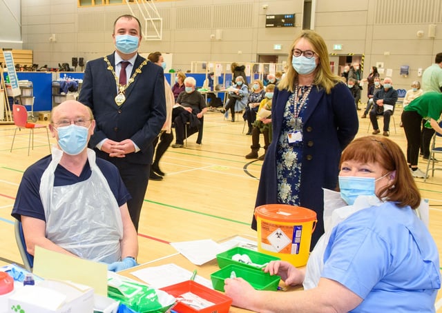Mayor Brian Tierney pictured previously at the Covid -19 vaccination centre in the Foyle Arena with Western Health and Social Care Trust staff who are delivering the vaccine programme. Included were Dr. Alan McKinney who is one of the retired doctors to help during the pandemic, Anne McConnell, HR Director WHSCT and School nurse Geraldine Mulholland. Picture Martin McKeown.