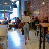Customers pictured in the Scullery Café, Waterloo Street last summer. Children under 12 are not counted in the six per table maximum. DER2027GS – 001