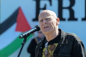 Veteran civil rights campaigner Eamonn McCann addresses the Palestinian solidarity Rally at Free Derry Wall on Saturday after last. Photo: George Sweeney. DER2120GS – 075