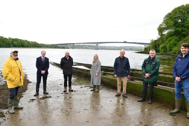 Junior Ministers Declan Kearney and Gordon Lyons with the group behind Eden Project Foyle.