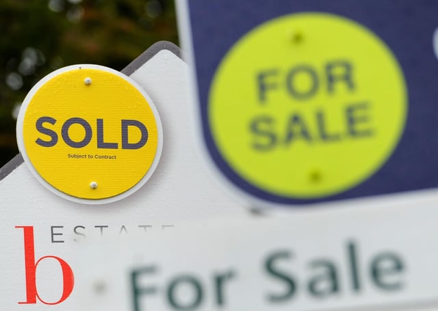 File photo dated 14/10/14 of sold and for sale signs. House prices across the UK are expected to increase by 4 percent this year, according to a property group's forecasts. Issue date: Tuesday March 9, 2021.