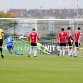 Nathan Gartside saves from Shane Griffin's free-kick at the end of the first half in Waterford. Photograph by Kevin Moore (Maiden City Images).