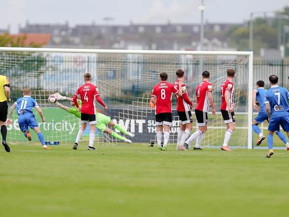 Nathan Gartside saves from Shane Griffin's free-kick at the end of the first half in Waterford. Photograph by Kevin Moore (Maiden City Images).