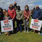The Doherty and Glackin families from Malin Head were at the mica rally at the Shorefront on Saturday after last. Photo: George Sweeney. DER2120GS – 043