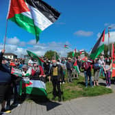 Some of the attendance at the Palestinian solidarity Rally at Free Derry Wall on Saturday after last. Photo: George Sweeney. DER2120GS – 070