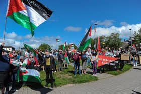Some of the attendance at the Palestinian solidarity Rally at Free Derry Wall on Saturday after last. Photo: George Sweeney. DER2120GS – 070